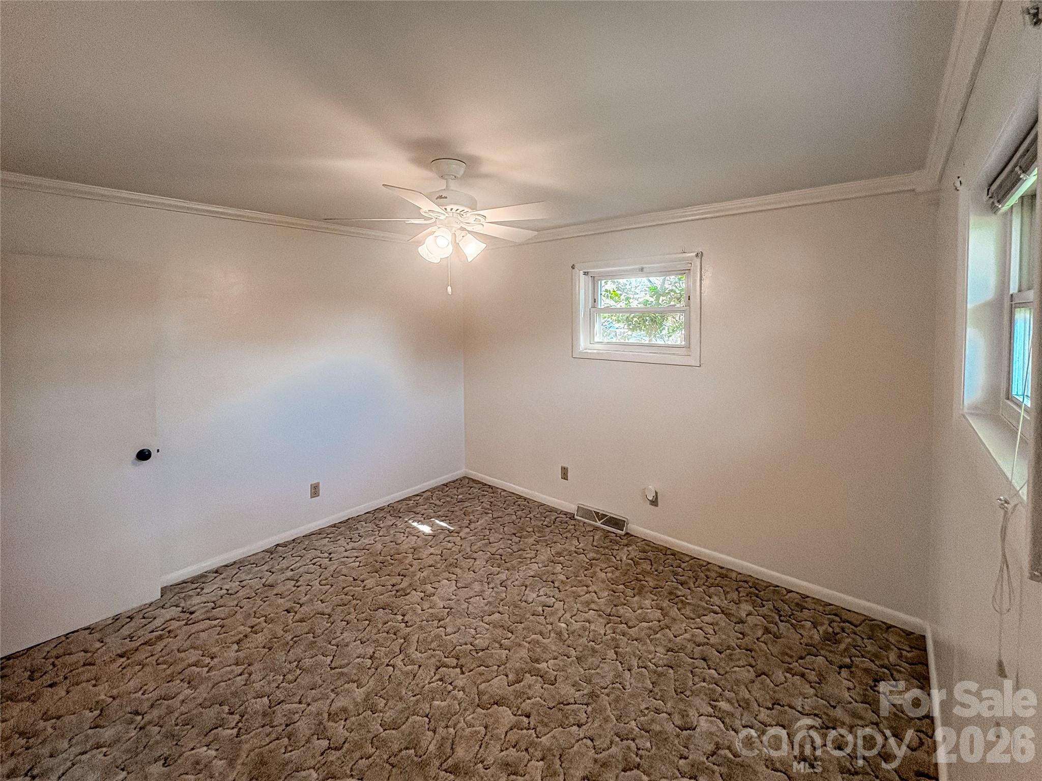 2011 Mountain Creek Road Albemarle, NC 28001 - Photo 20 of 27 an empty room with a window