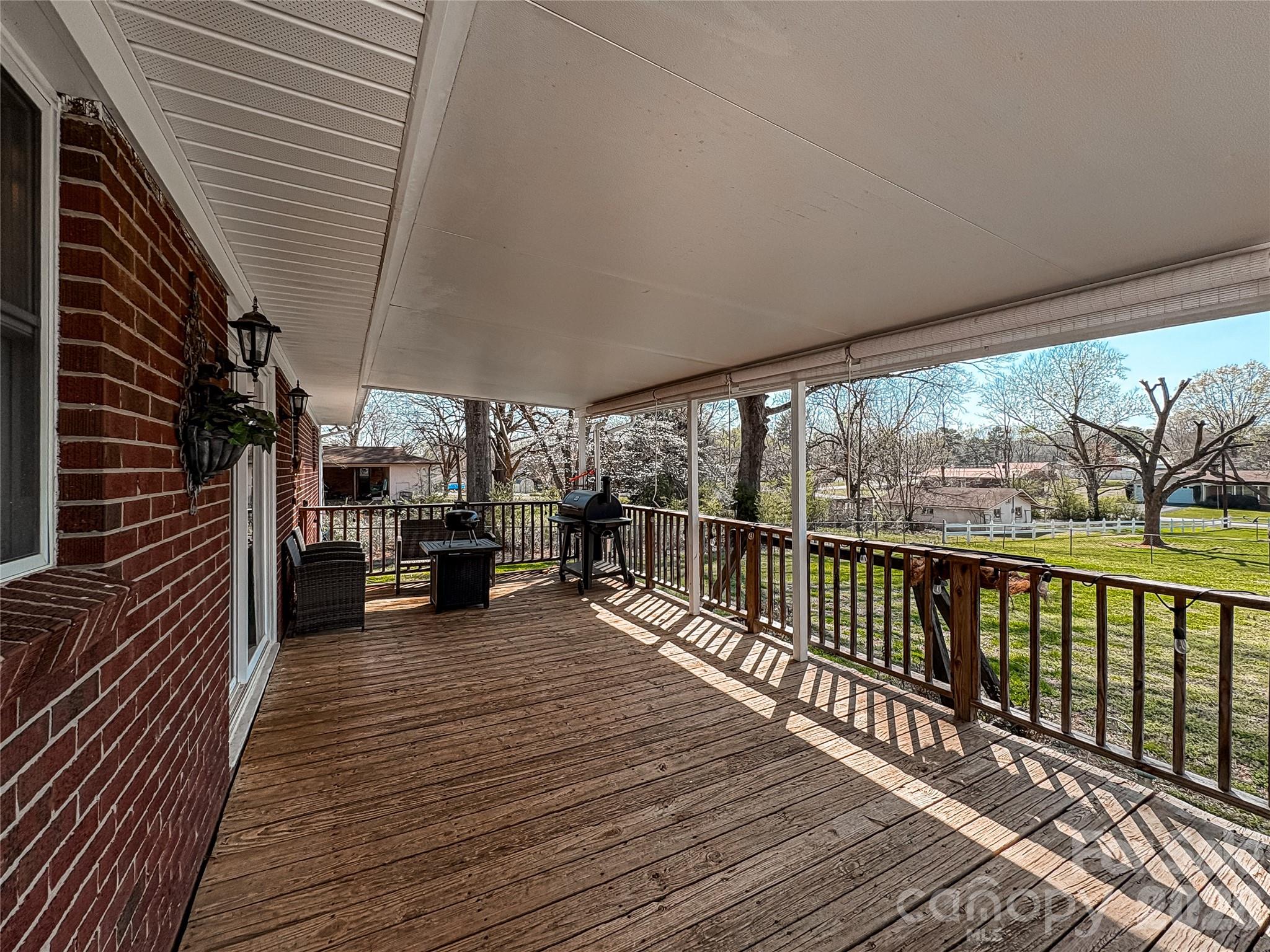 2011 Mountain Creek Road Albemarle, NC 28001 - Photo 25 of 27 a view of a balcony with wooden floor