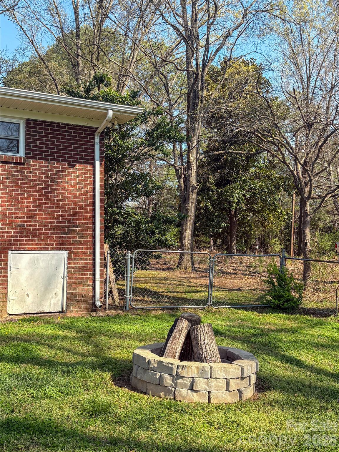 2011 Mountain Creek Road Albemarle, NC 28001 - Photo 27 of 27 a yard with some trees in the background