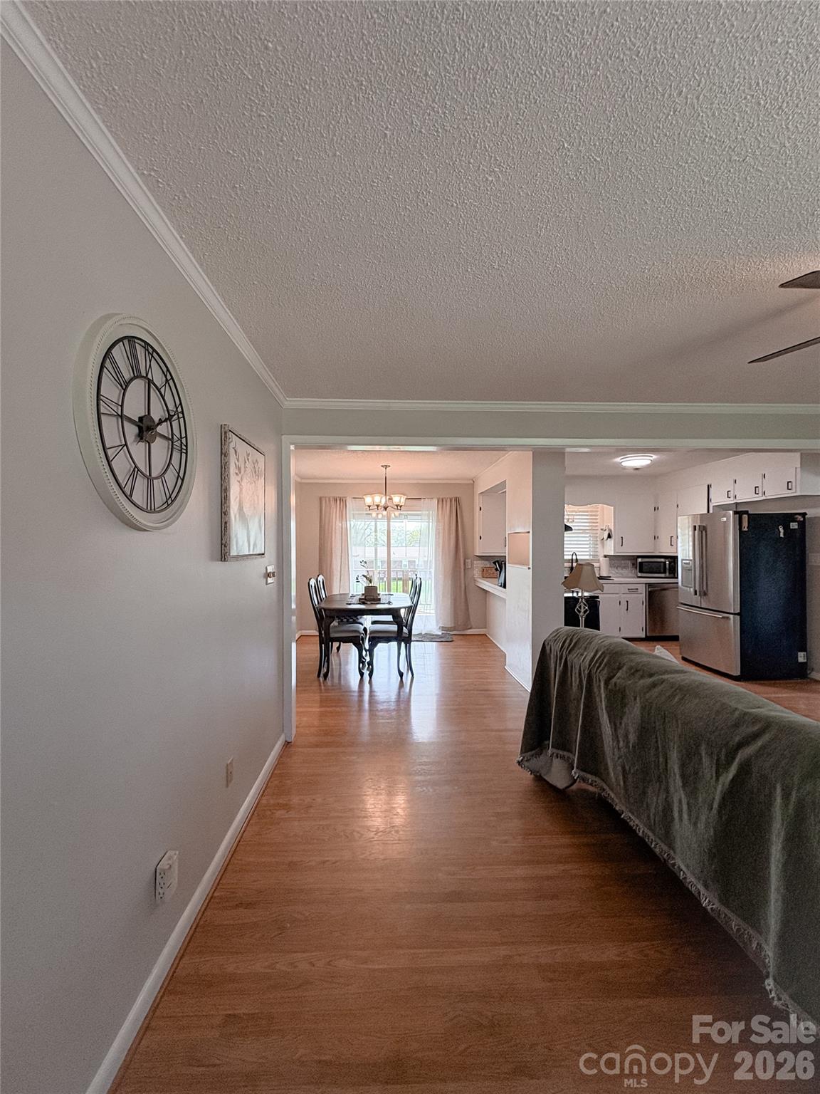 2011 Mountain Creek Road Albemarle, NC 28001 - Photo 6 of 27 a living room with furniture and wooden floor