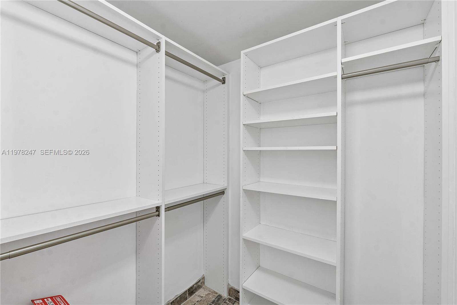 60 Southwest 13th Street, Unit 1921 Miami, FL 33130 - Photo 19 of 23 a view of an empty walk in closet
