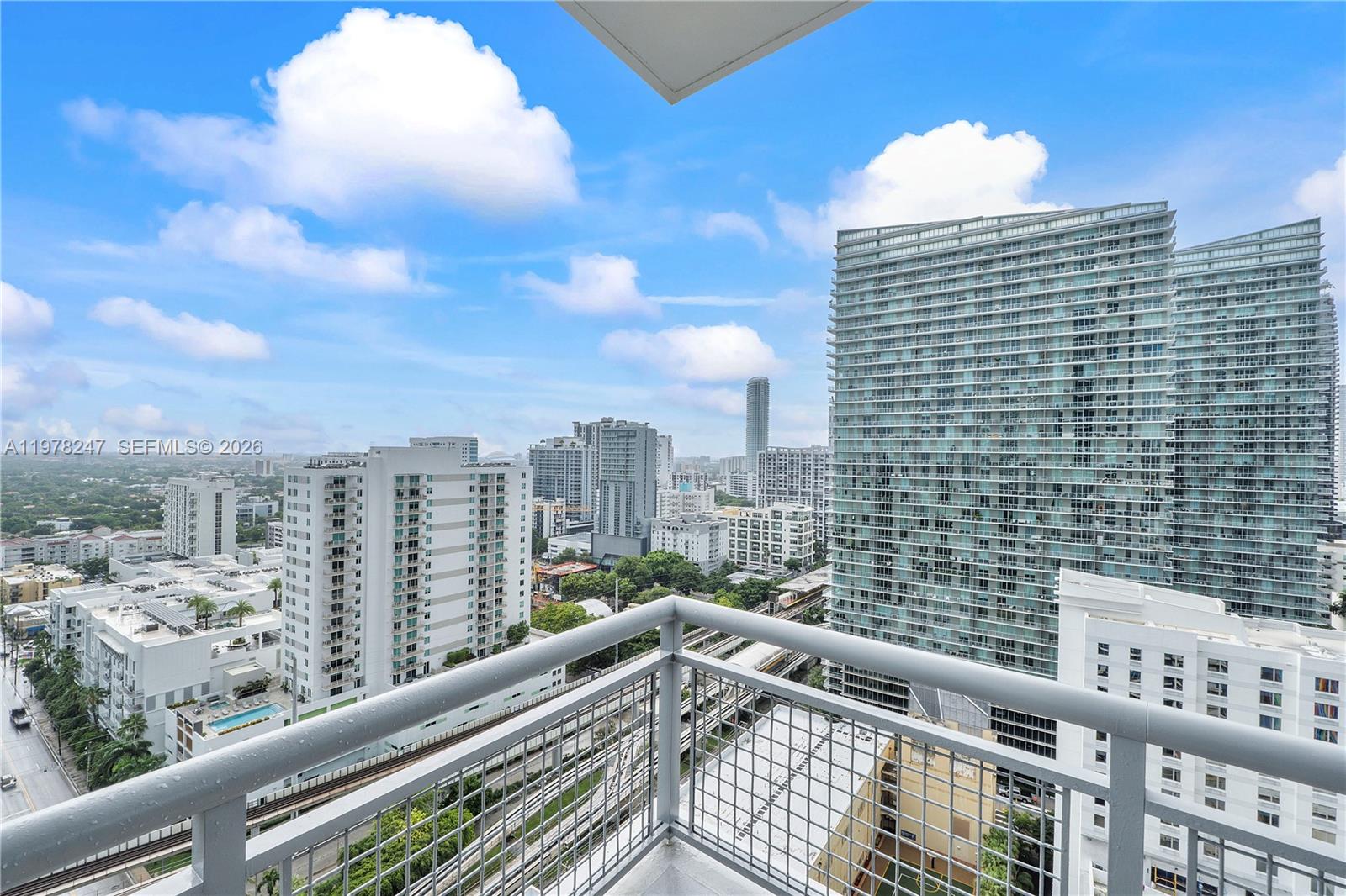 60 Southwest 13th Street, Unit 1921 Miami, FL 33130 - Photo 10 of 23 a view of a city from a balcony