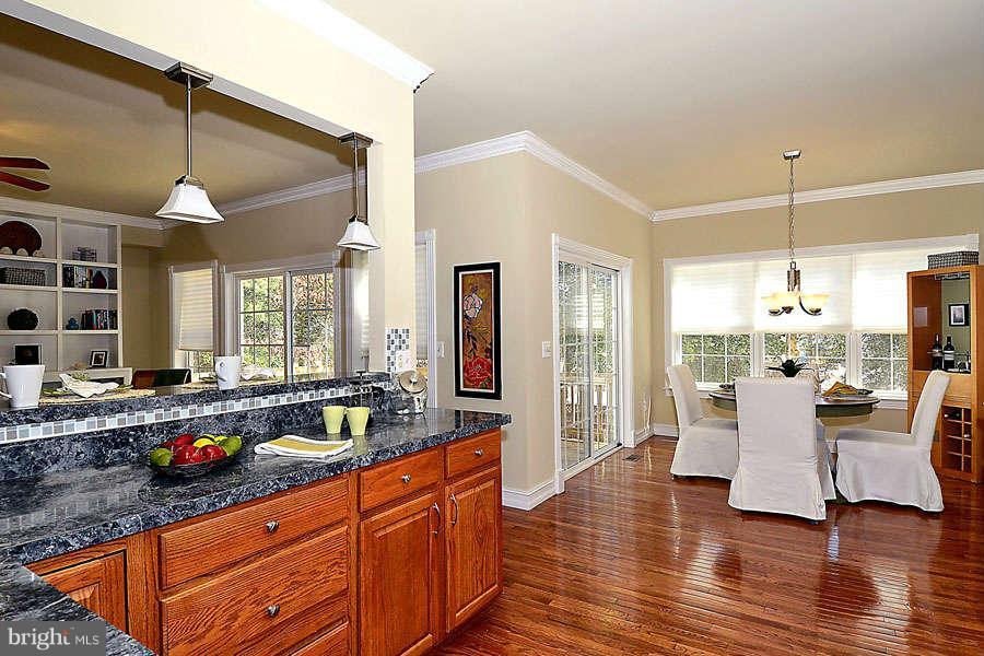 581 Manor Road Severna Park, MD 21146 - Photo 5 of 30 Rich Textures of Hardwood / Granite / Glass