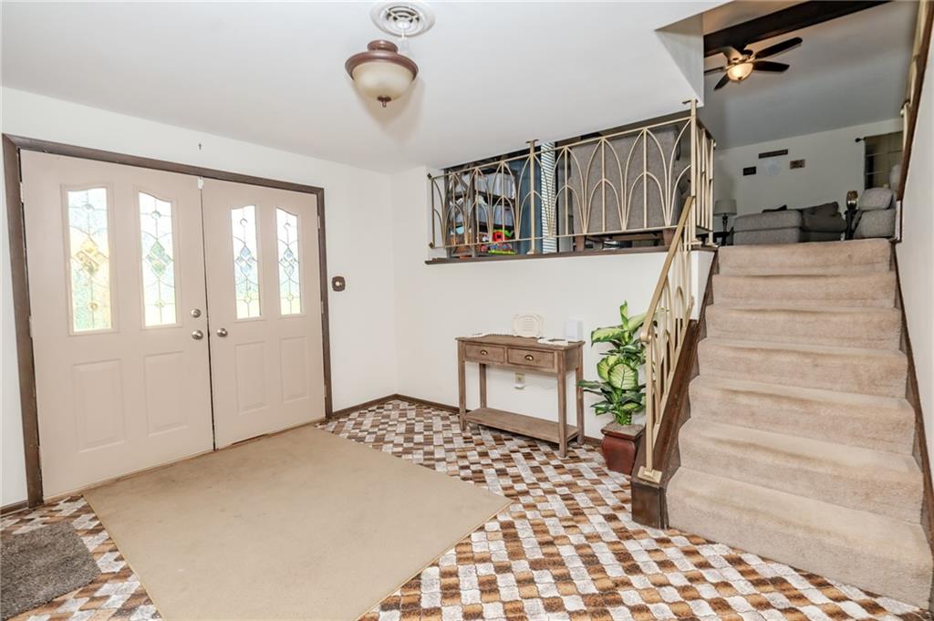 2229 Ramsey Road Monroeville, PA 15146 - Photo 28 of 40 a view of a hallway to a livingroom with furniture