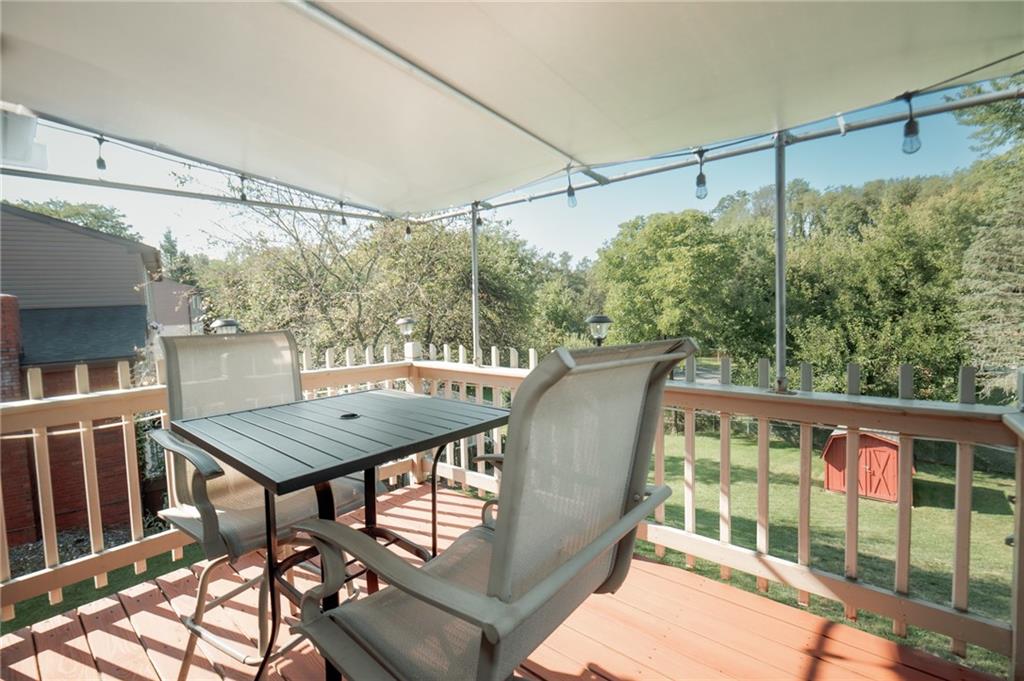 2229 Ramsey Road Monroeville, PA 15146 - Photo 34 of 40 a view of a balcony with wooden floor and outdoor seating