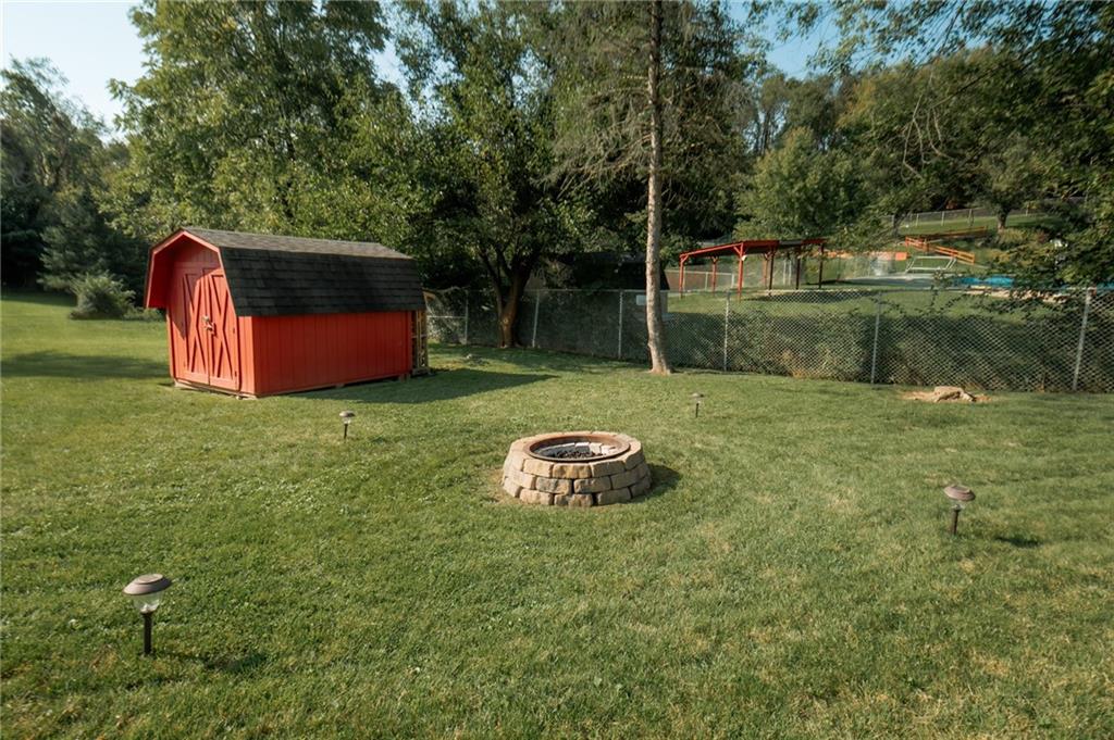 2229 Ramsey Road Monroeville, PA 15146 - Photo 36 of 40 a backyard of a house with barbeque oven and trees