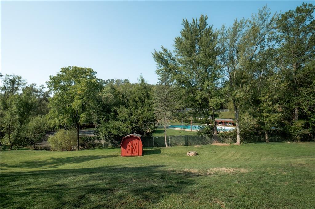 2229 Ramsey Road Monroeville, PA 15146 - Photo 37 of 40 a view of a white house in a big yard with large trees