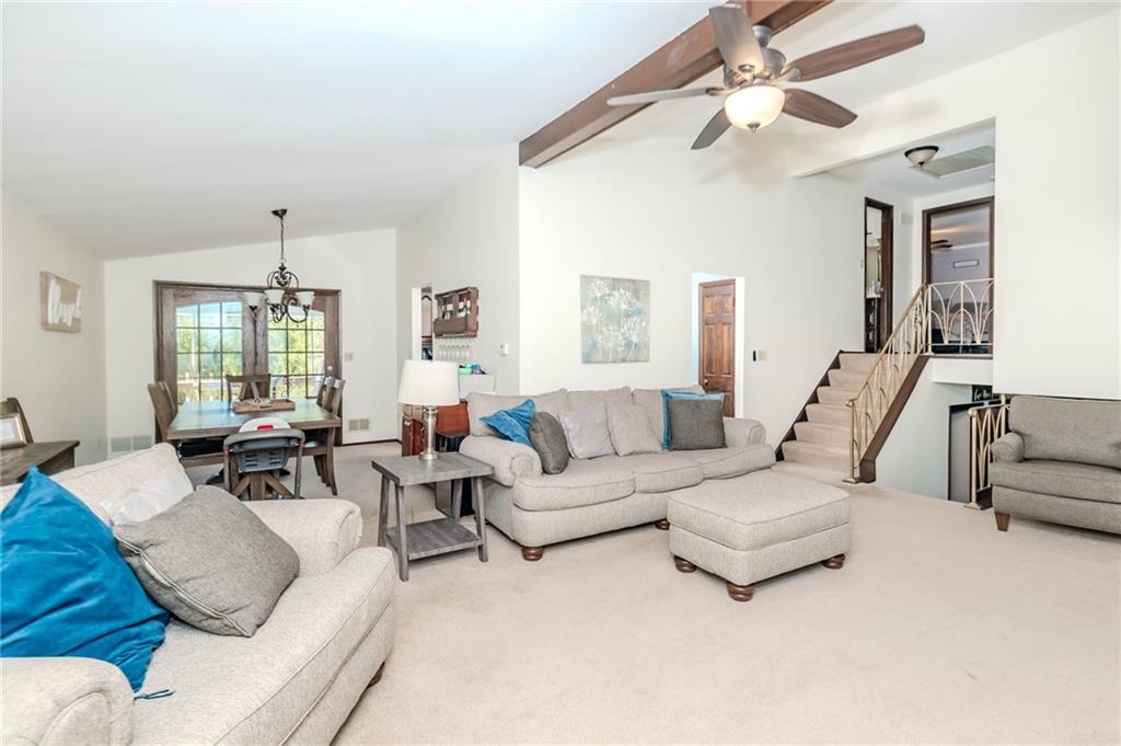 2229 Ramsey Road Monroeville, PA 15146 - Photo 4 of 40 a living room with furniture and a chandelier