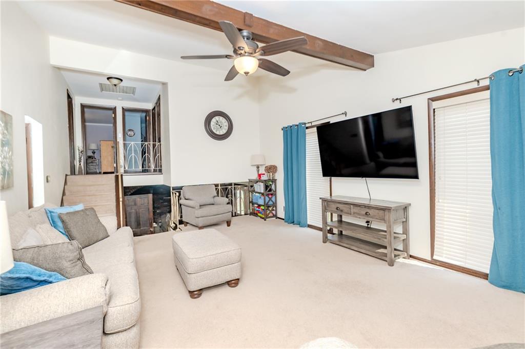 2229 Ramsey Road Monroeville, PA 15146 - Photo 5 of 40 a living room with furniture and a flat screen tv