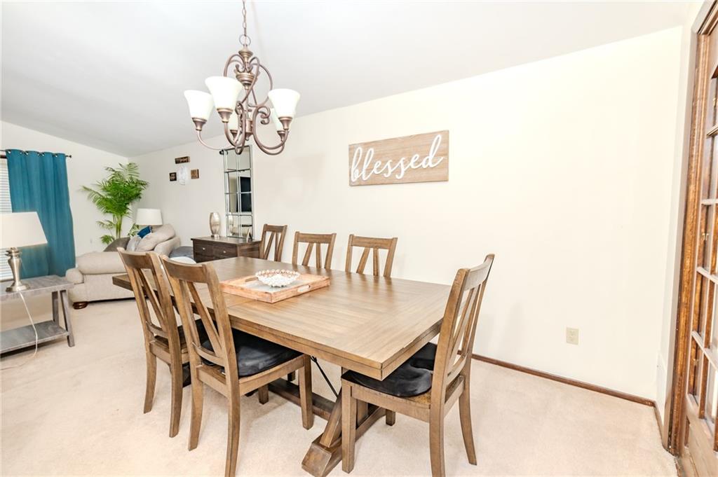 2229 Ramsey Road Monroeville, PA 15146 - Photo 8 of 40 a dining room with furniture and wooden floor