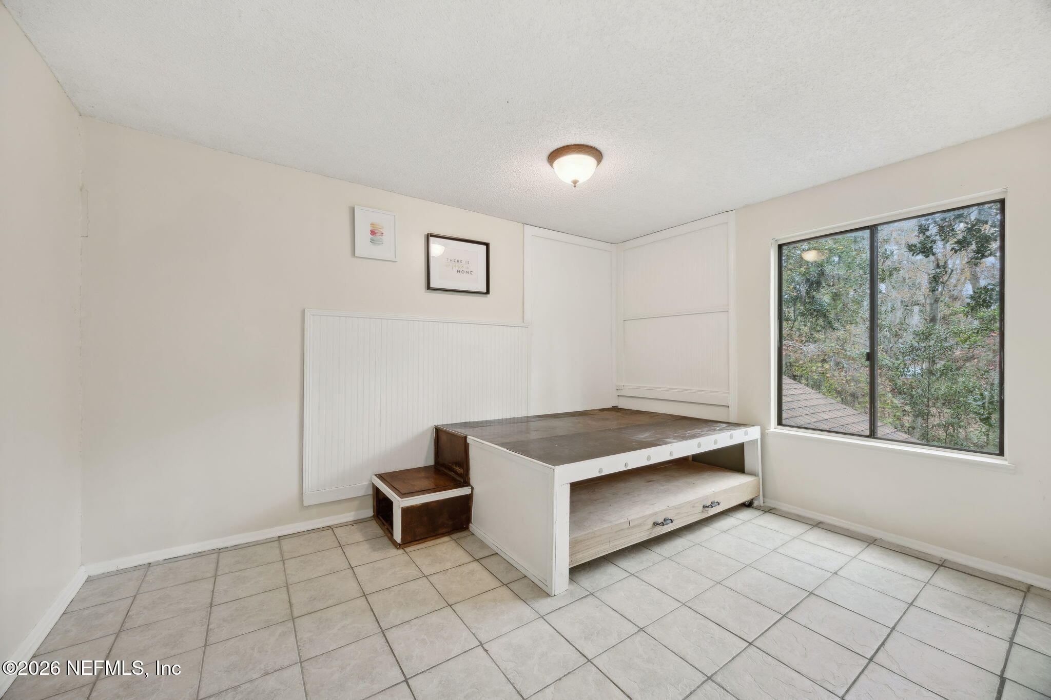 2431 Cypress Springs Road Orange Park, FL 32073 - Photo 41 of 83 a room with a bed and a window