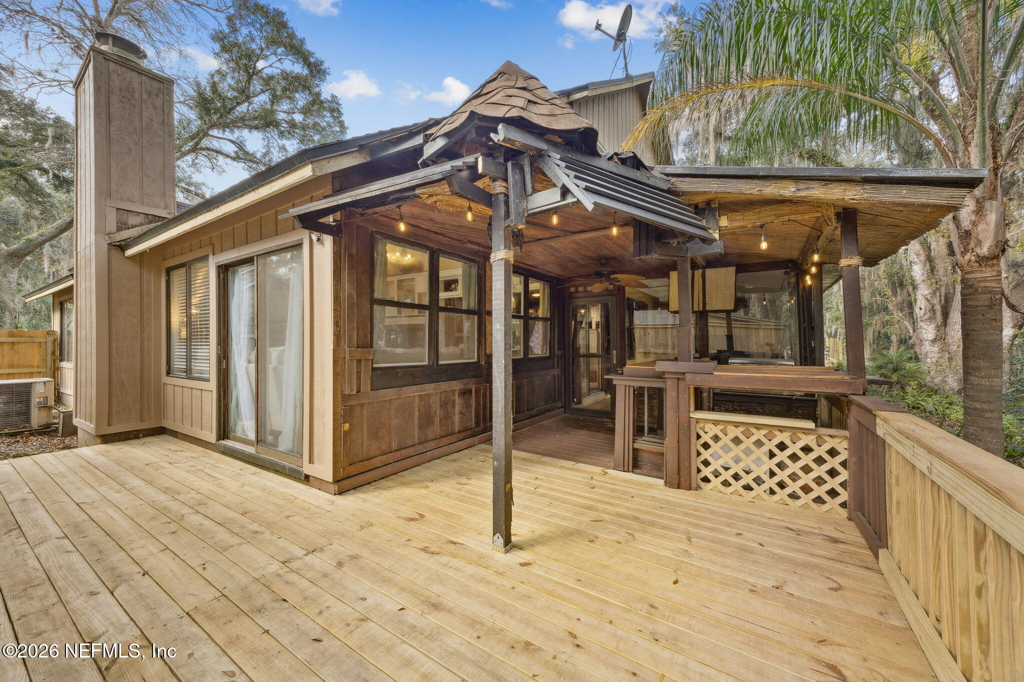 2431 Cypress Springs Road Orange Park, FL 32073 - Photo 50 of 83 a view of a chairs and table in the patio