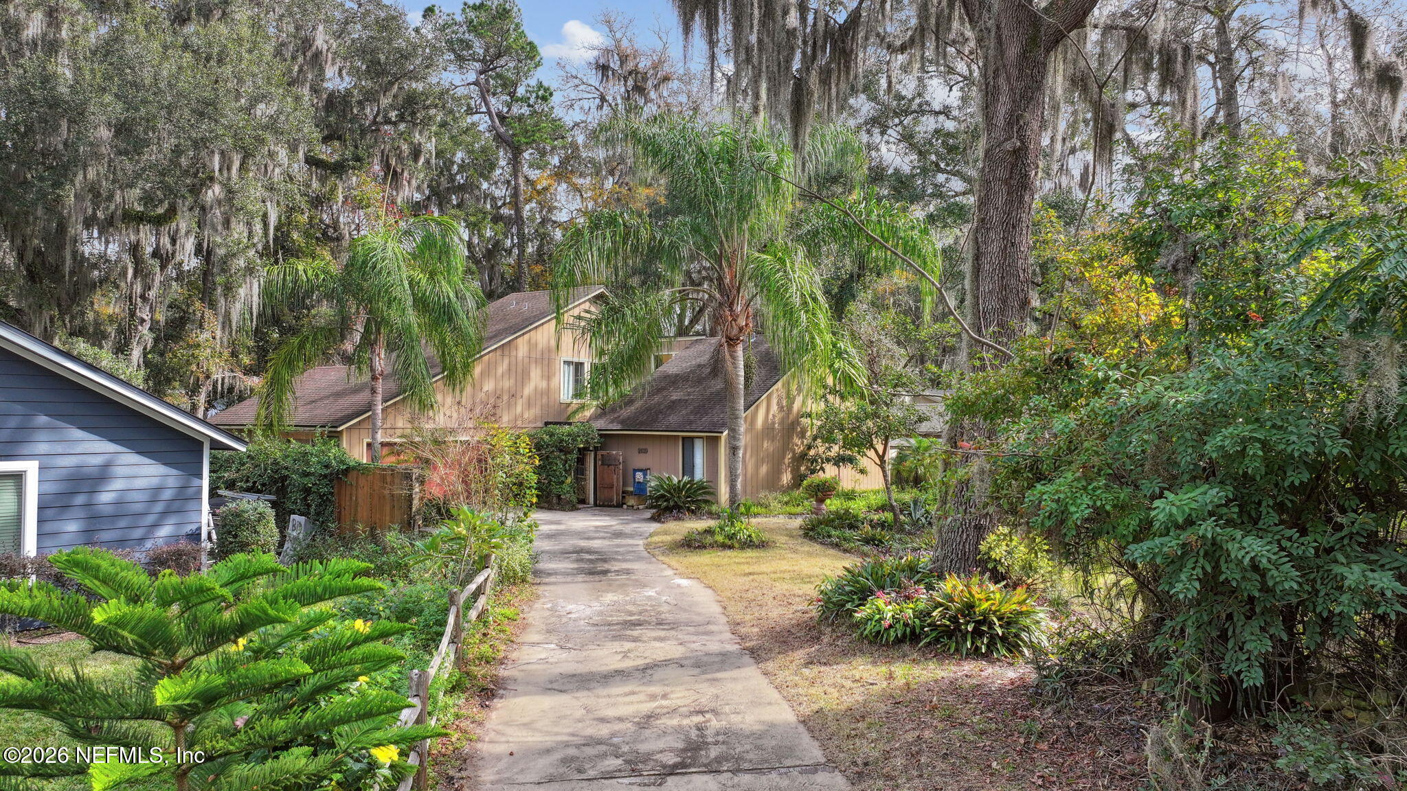 2431 Cypress Springs Road Orange Park, FL 32073 - Photo 53 of 83 a front view of a house with a yard and fountain