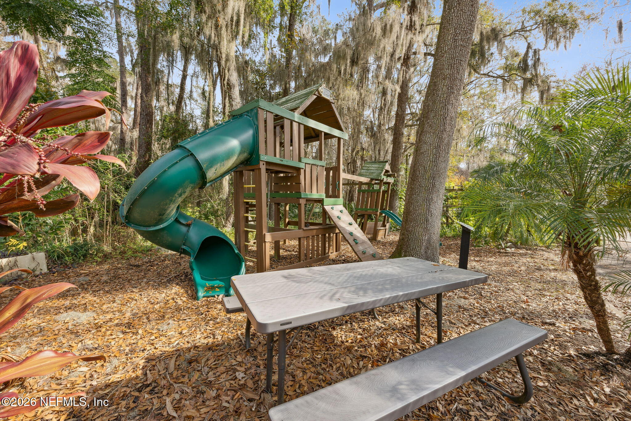 2431 Cypress Springs Road Orange Park, FL 32073 - Photo 65 of 83 a view of a house with backyard and sitting area