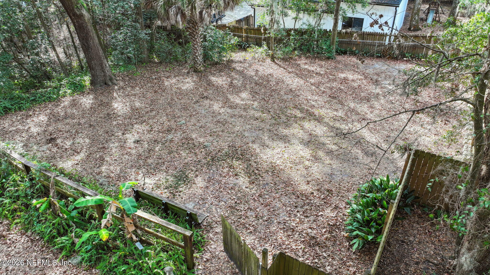 2431 Cypress Springs Road Orange Park, FL 32073 - Photo 67 of 83 a backyard of a house with lots of green space