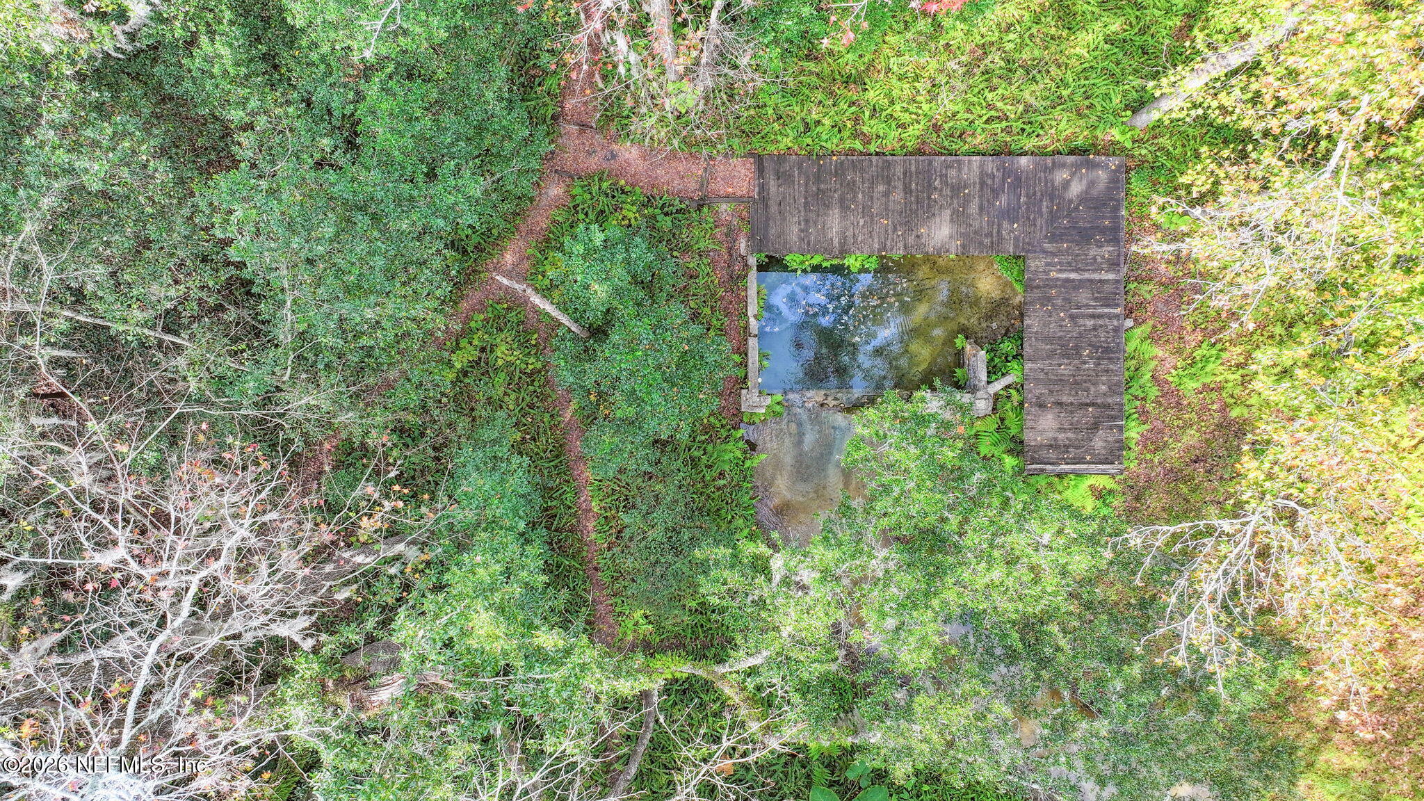 2431 Cypress Springs Road Orange Park, FL 32073 - Photo 72 of 83 an aerial view of residential house with outdoor space and trees all around