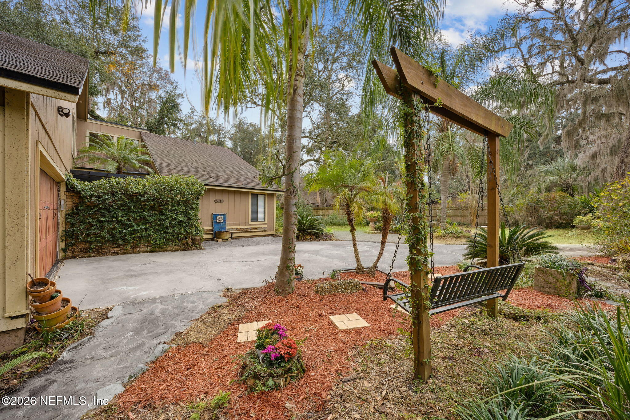 2431 Cypress Springs Road Orange Park, FL 32073 - Photo 9 of 83 a backyard of a house with lots of green space
