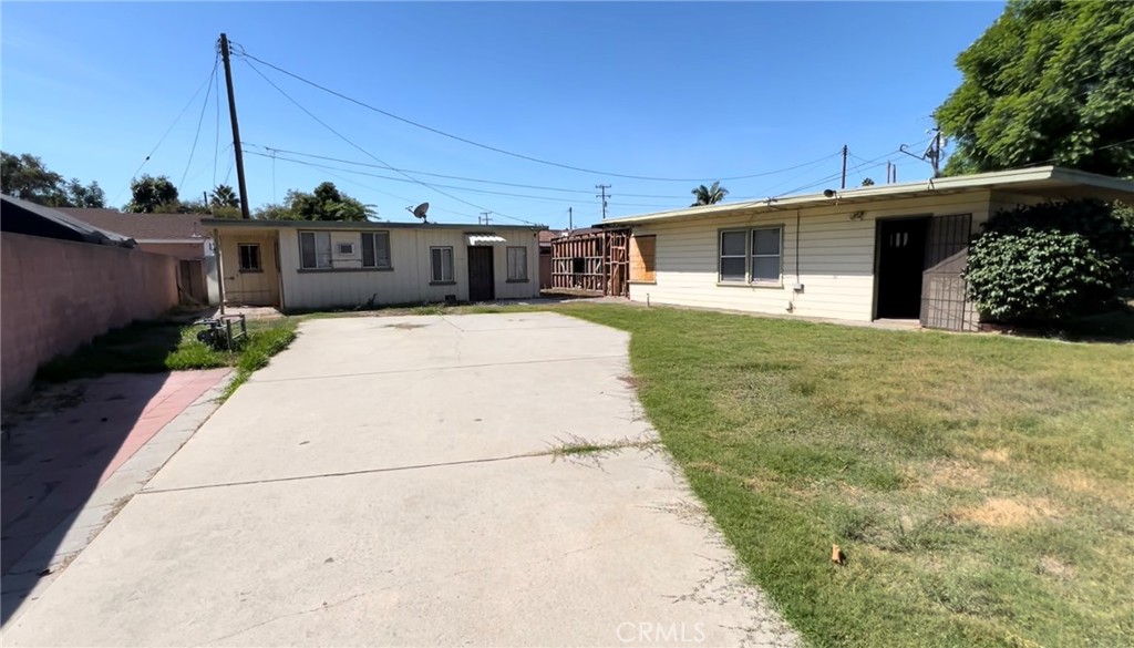 12012 Ranchito Street El Monte, CA 91732 - Photo 1 of 1 a front view of a house with a yard