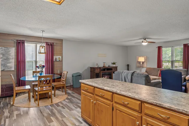 a view of living room filled with furniture and window