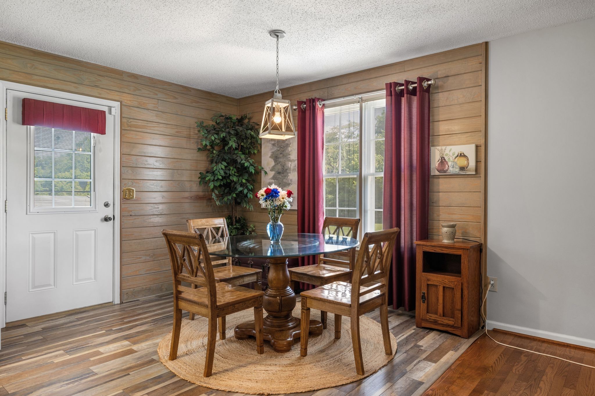 4628 Dugger Road Culleoka, TN 38451 - Photo 18 of 40 a view of a dining room with furniture window and wooden floor