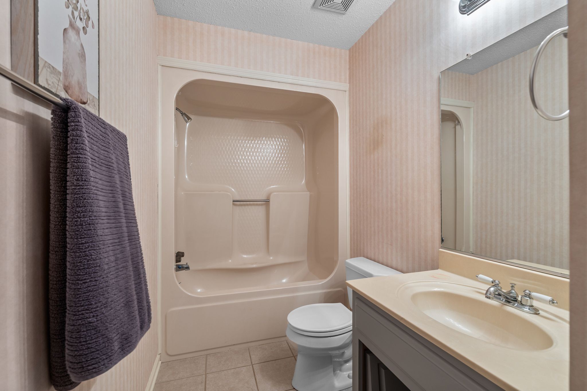 4628 Dugger Road Culleoka, TN 38451 - Photo 25 of 40 a bathroom with a granite countertop sink toilet and shower