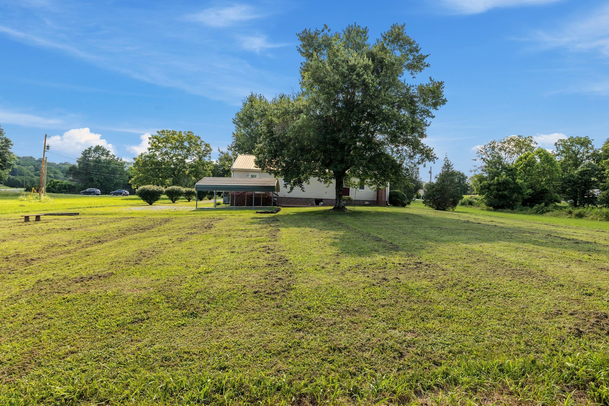 4628 Dugger Road Culleoka, TN 38451 - Photo 27 of 40 a swimming pool with an outdoor space and seating area