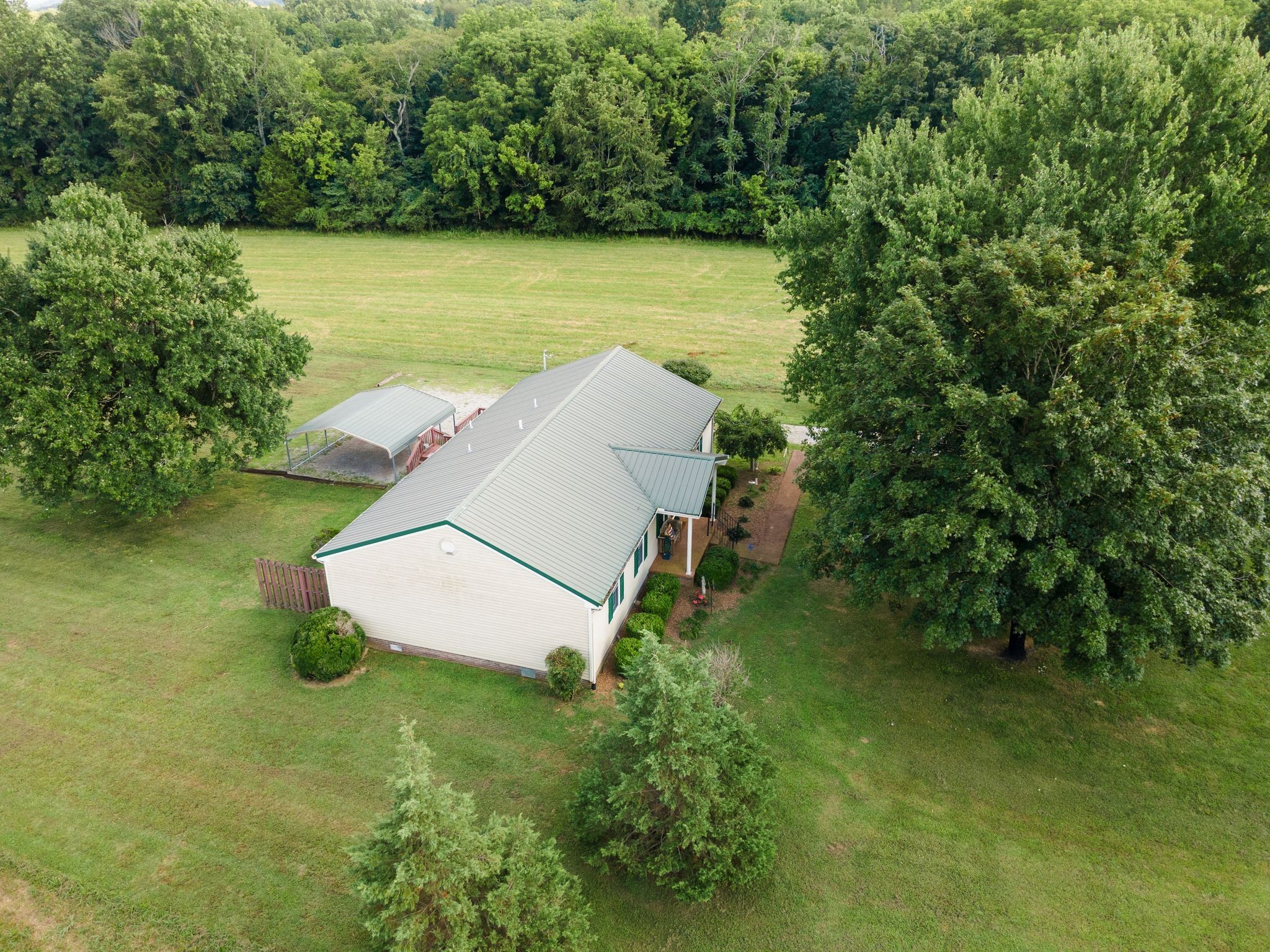 4628 Dugger Road Culleoka, TN 38451 - Photo 34 of 40 an aerial view of a house with a yard and lake view