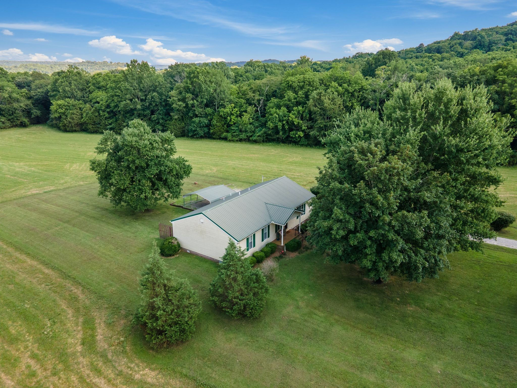 4628 Dugger Road Culleoka, TN 38451 - Photo 7 of 40 an aerial view of a house with a yard