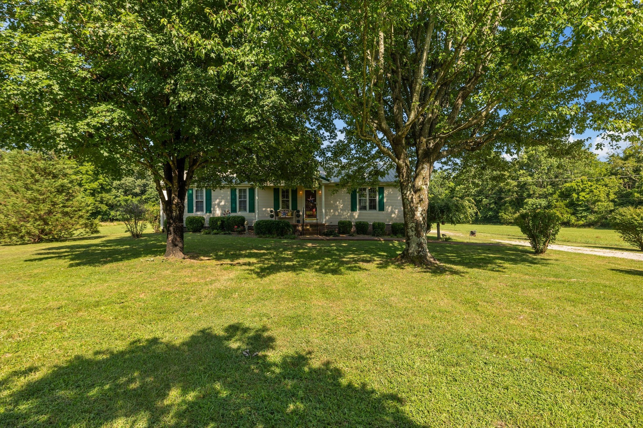 4628 Dugger Road Culleoka, TN 38451 - Photo 9 of 40 a view of a swimming pool with an outdoor space and seating area