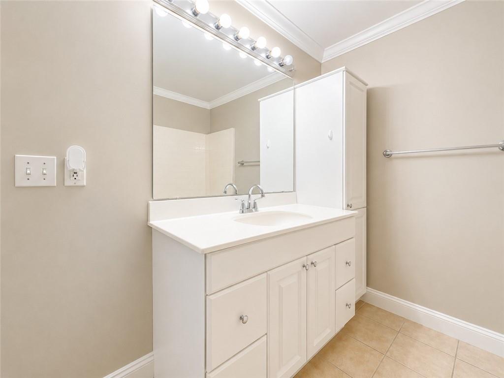 212 Craigtown Road Northeast Calhoun, GA 30701 - Photo 10 of 21 a bathroom with a double vanity sink and a mirror