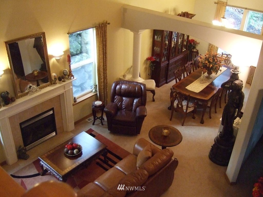 23812 22nd Avenue West Bothell, WA 98021 - Photo 4 of 19 a living room with furniture and a fireplace
