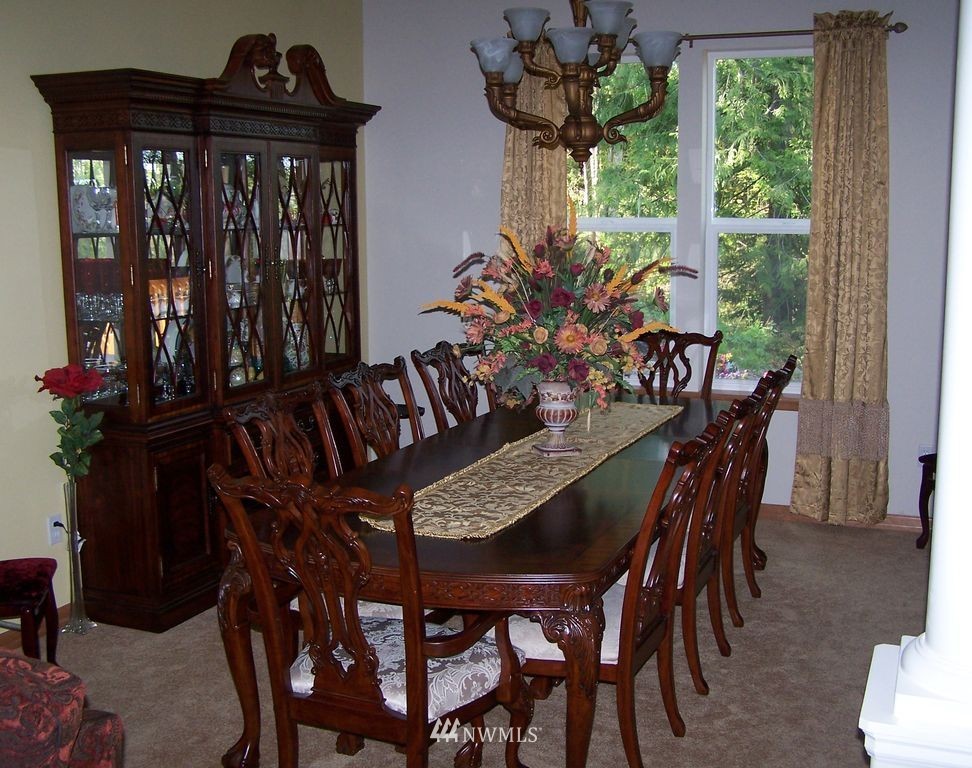 23812 22nd Avenue West Bothell, WA 98021 - Photo 7 of 19 a view of a dining room with furniture window and outside view