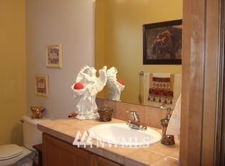 23812 22nd Avenue West Bothell, WA 98021 - Photo 10 of 19 a bathroom with a sink mirror and toilet
