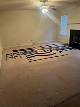a view of room with wooden floor