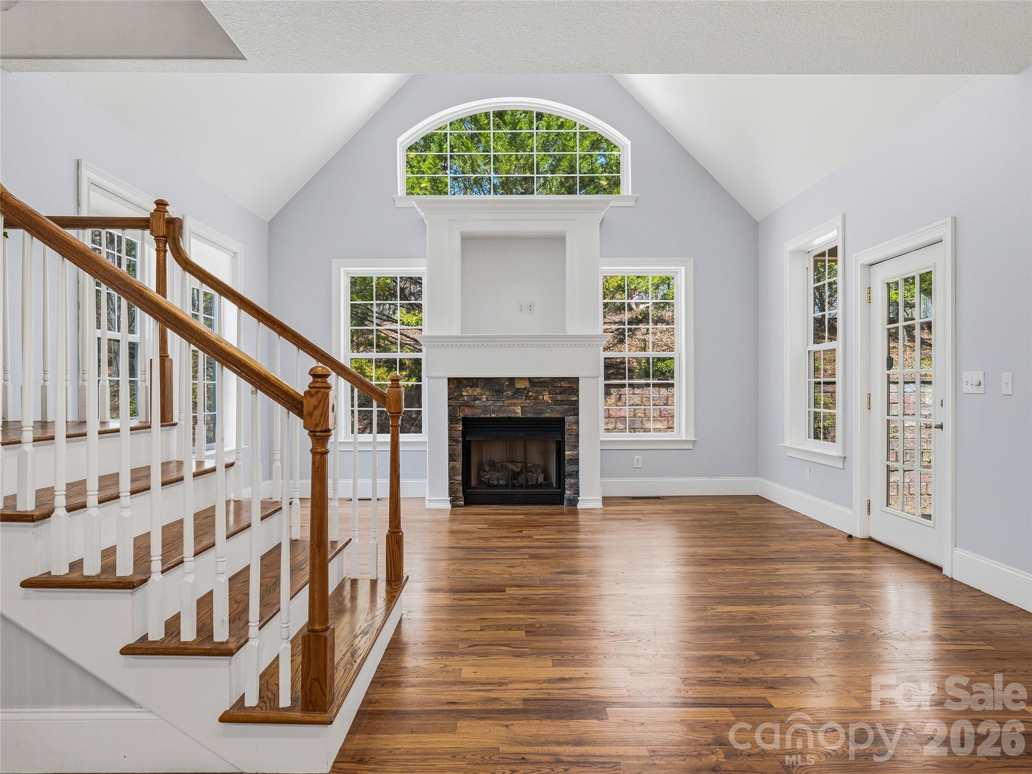 196 Blackbird Lane Tryon, NC 28782 - Photo 11 of 44 a view of an entryway with wooden floor and a fireplace