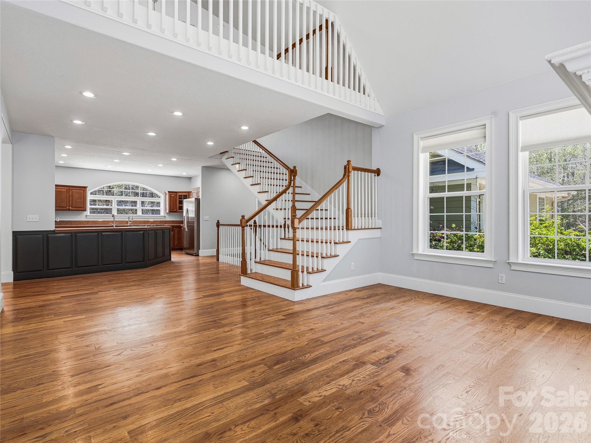 196 Blackbird Lane Tryon, NC 28782 - Photo 12 of 44 a view of a livingroom with wooden floor and stairs