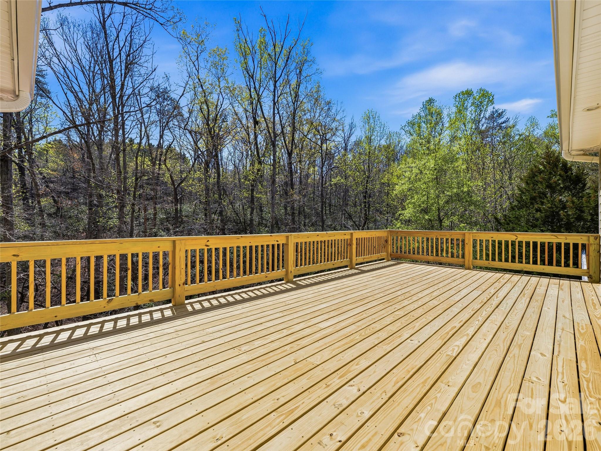 196 Blackbird Lane Tryon, NC 28782 - Photo 20 of 44 a view of deck with wooden floor and fence