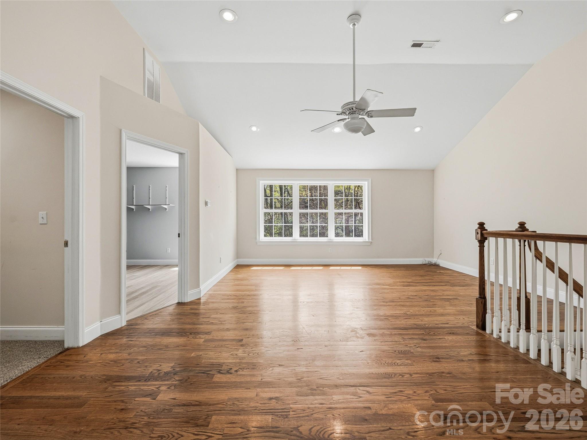 196 Blackbird Lane Tryon, NC 28782 - Photo 30 of 44 a view of an empty room with a window and a kitchen view