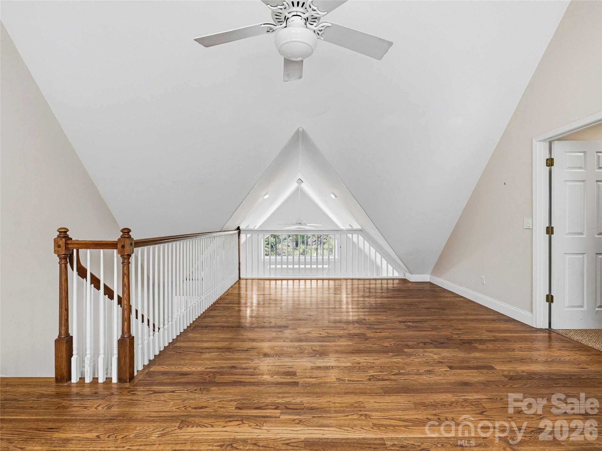 196 Blackbird Lane Tryon, NC 28782 - Photo 31 of 44 a view of an empty room with wooden floor