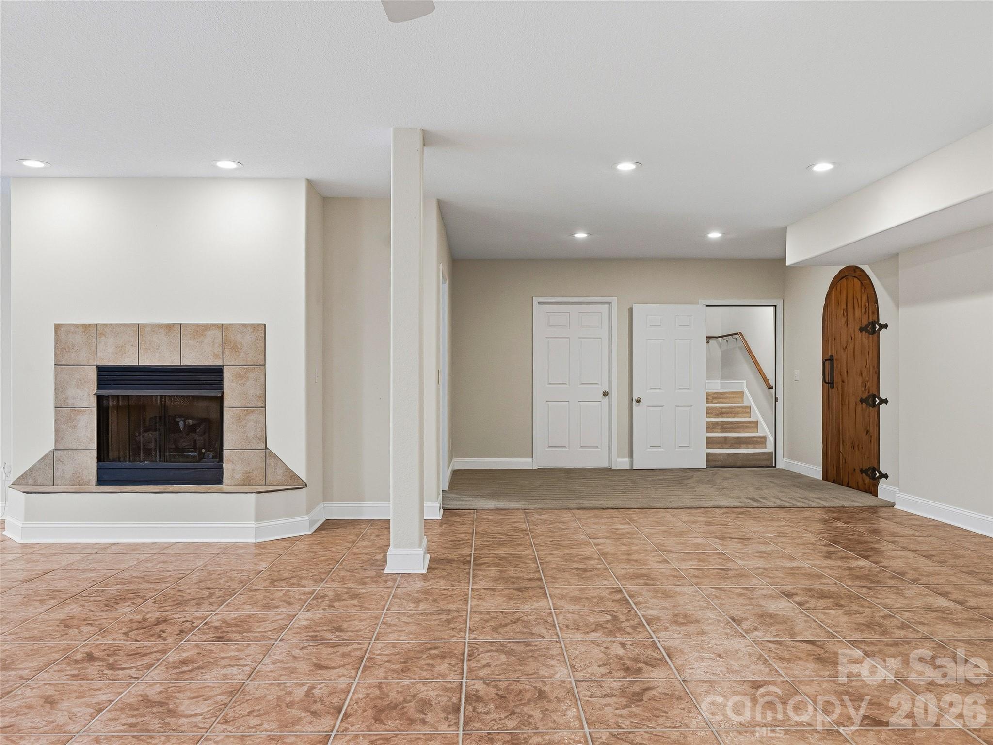 196 Blackbird Lane Tryon, NC 28782 - Photo 38 of 44 a view of an empty room with a fireplace