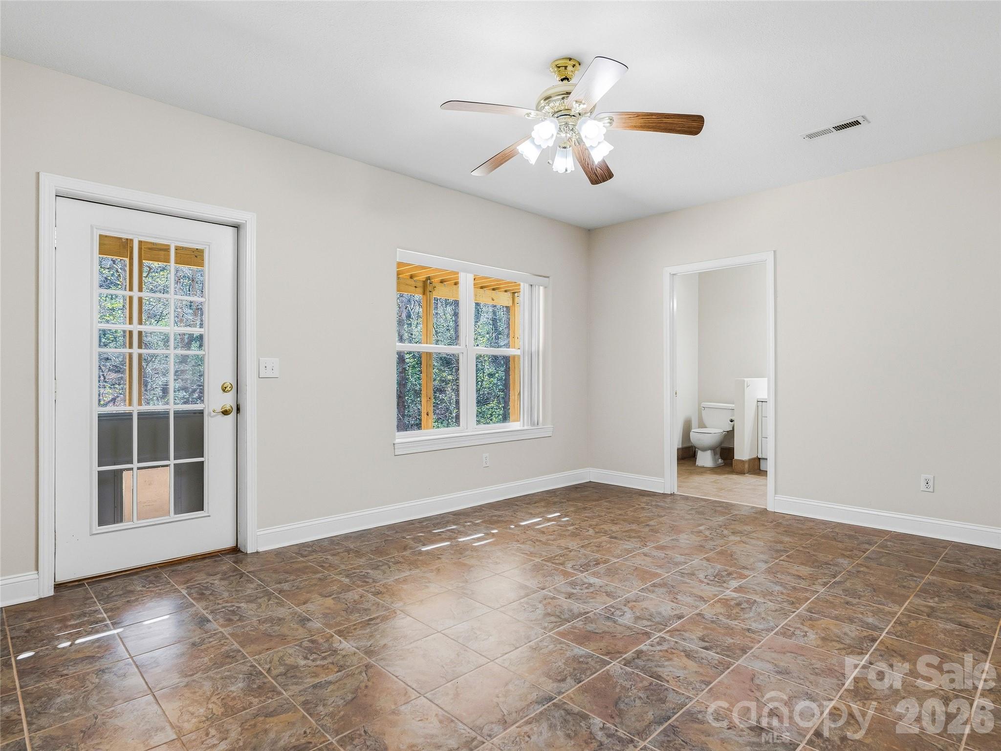 196 Blackbird Lane Tryon, NC 28782 - Photo 40 of 44 a view of an empty room with a window
