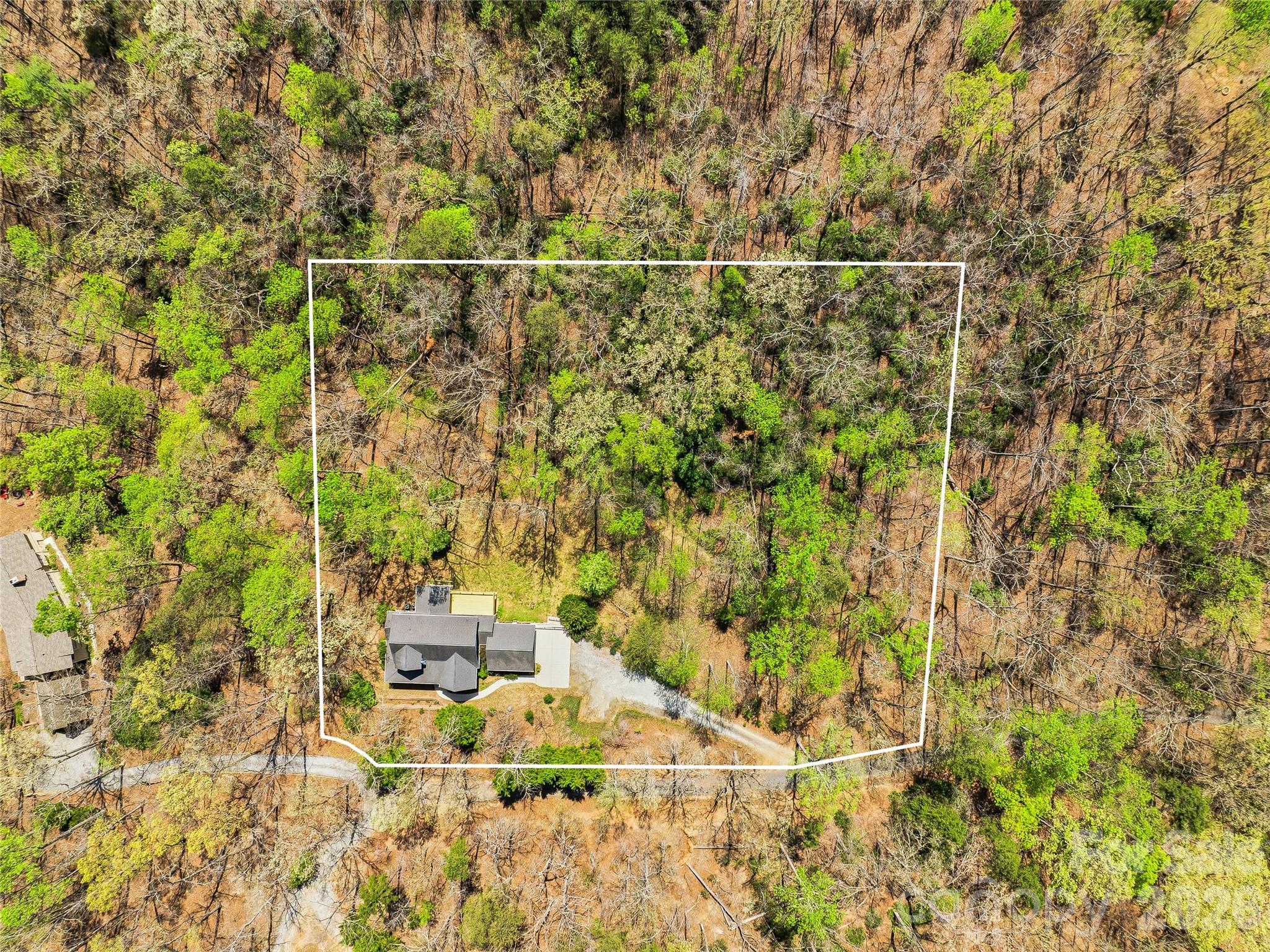 196 Blackbird Lane Tryon, NC 28782 - Photo 44 of 44 a bathroom with a shower and a sink