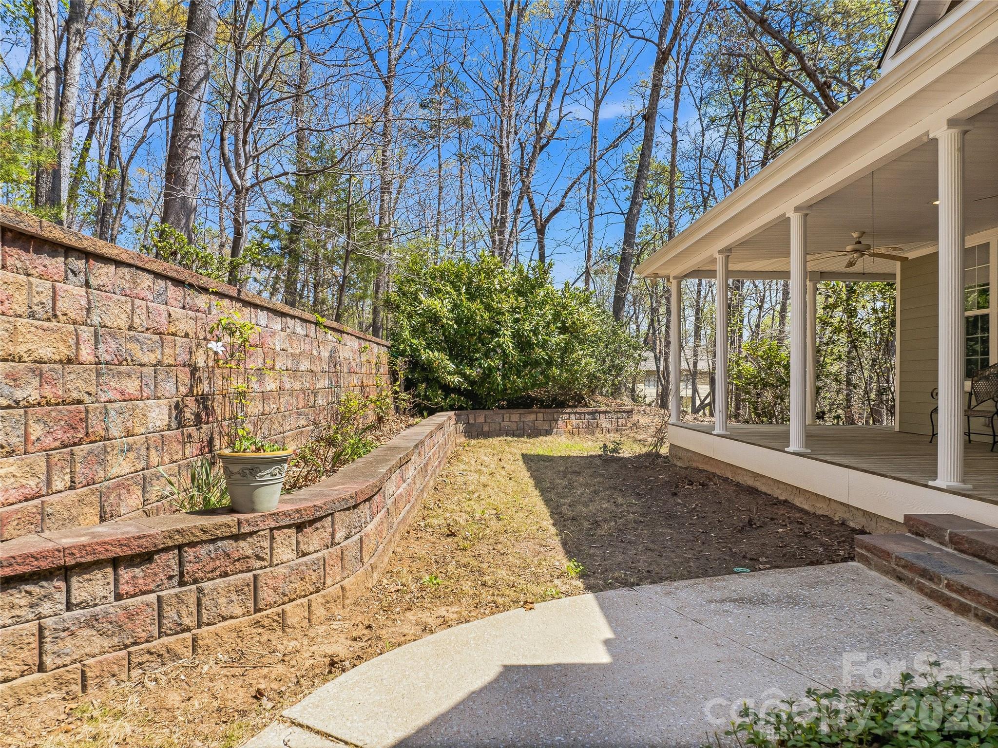196 Blackbird Lane Tryon, NC 28782 - Photo 5 of 44 a view of a big room with a large windows and plants