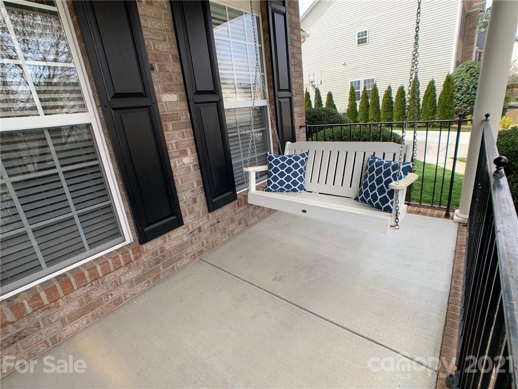 1920 Faison Avenue Fort Mill, SC 29708 - Photo 4 of 47 a view of a porch with a floor to ceiling window