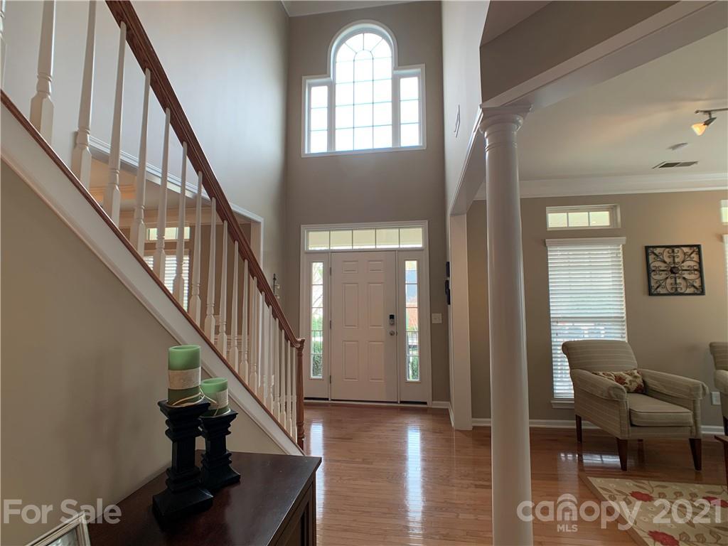 1920 Faison Avenue Fort Mill, SC 29708 - Photo 8 of 47 a view of entryway and hall with wooden floor
