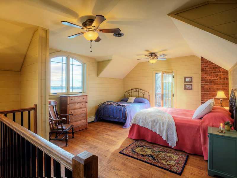 1321 Embden Pond Road Embden, ME 04958 - Photo 15 of 30 Bedroom. Large bedroom on the second...