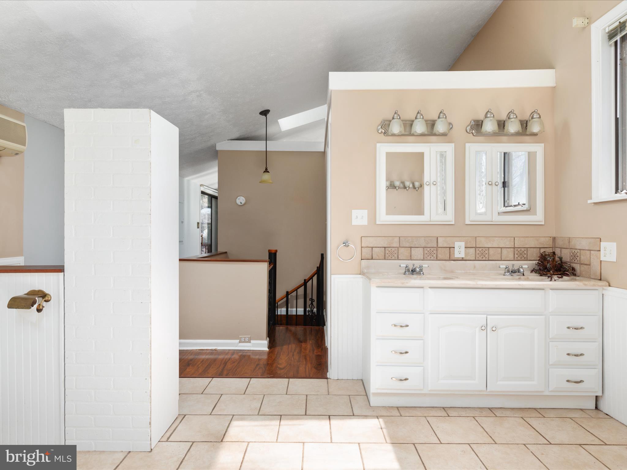 646 Old Dam Road Front Royal, VA 22630 - Photo 16 of 88 a bathroom with a sink a mirror and a shower