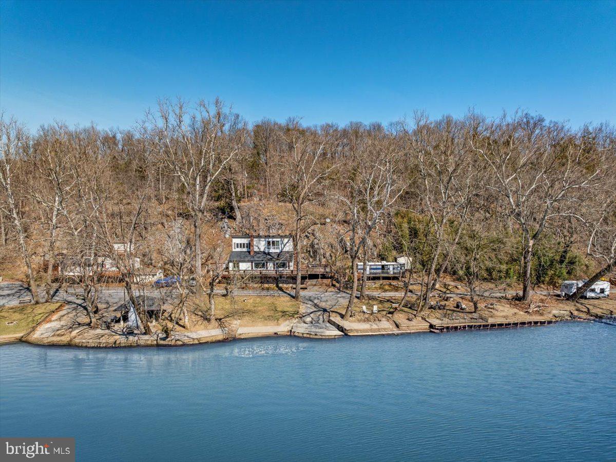 646 Old Dam Road Front Royal, VA 22630 - Photo 2 of 88 a view of a lake with houses