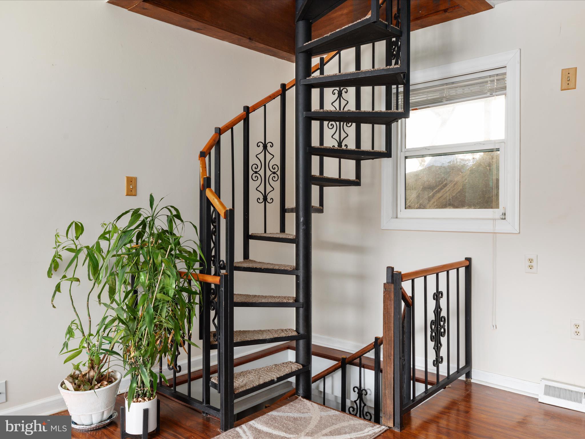 646 Old Dam Road Front Royal, VA 22630 - Photo 23 of 88 a view of entryway with wooden floor and stairs