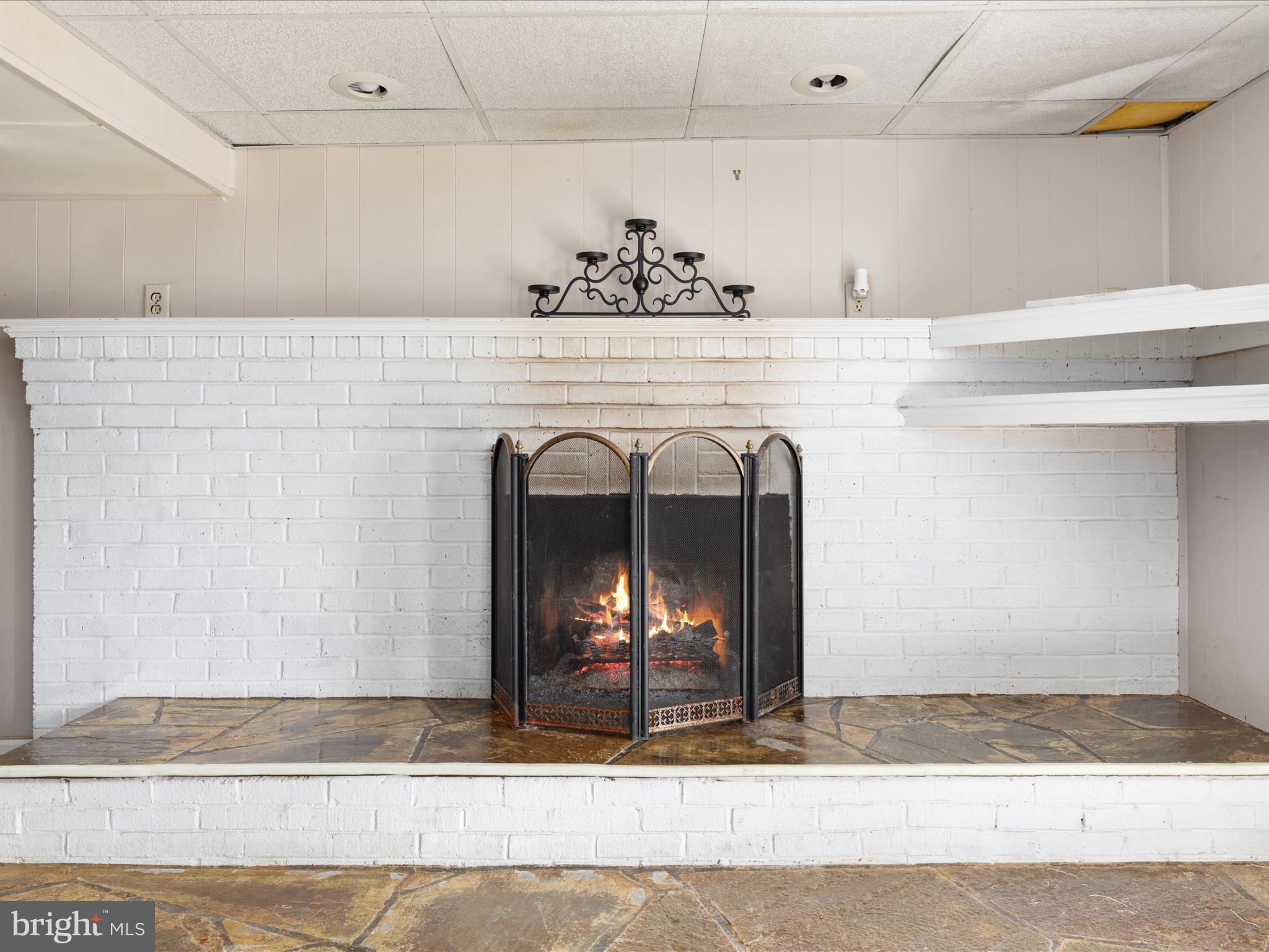 646 Old Dam Road Front Royal, VA 22630 - Photo 27 of 88 a view of a kitchen with kitchen island sink and living room view